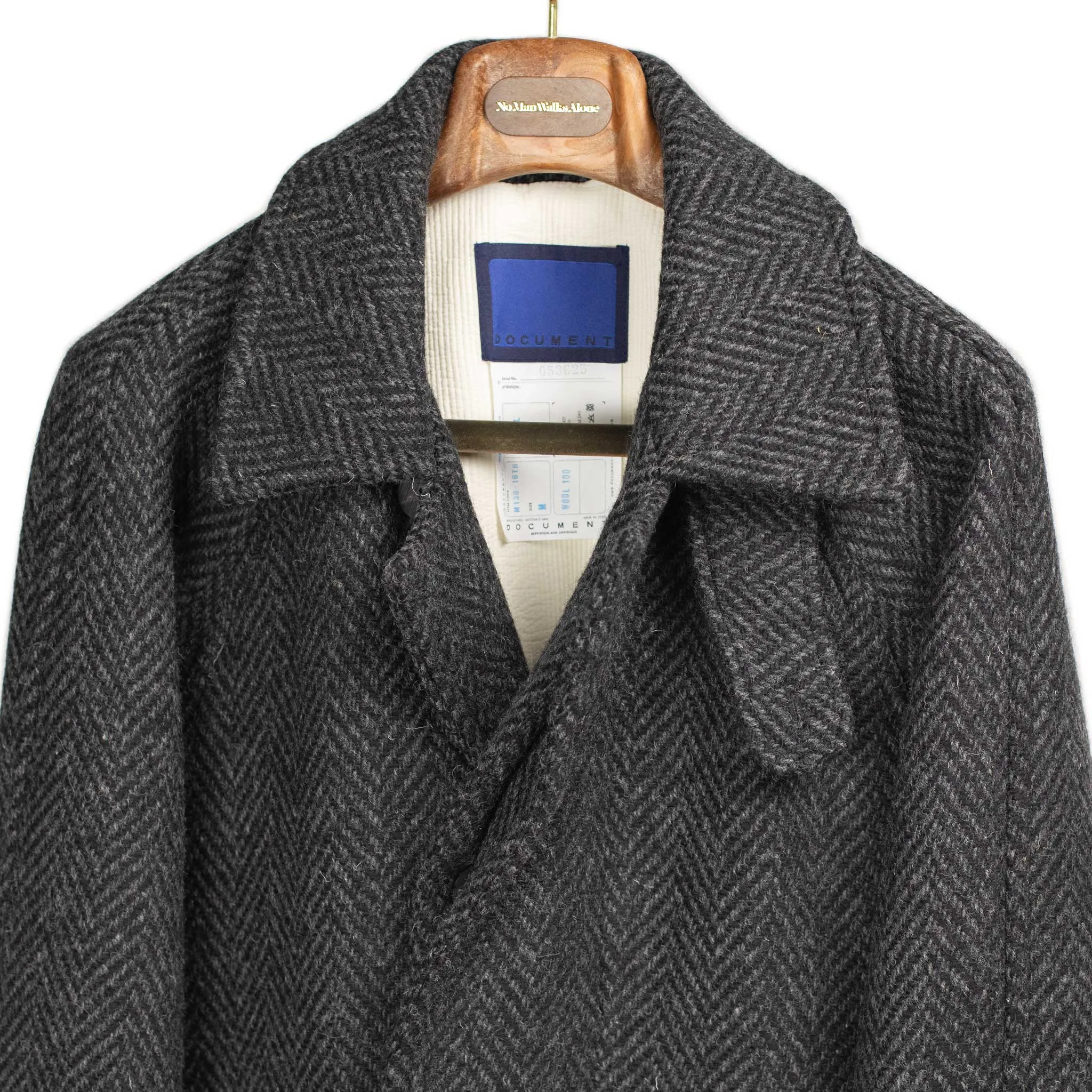 Belted balmacaan in grey herringbone wool donegal tweed