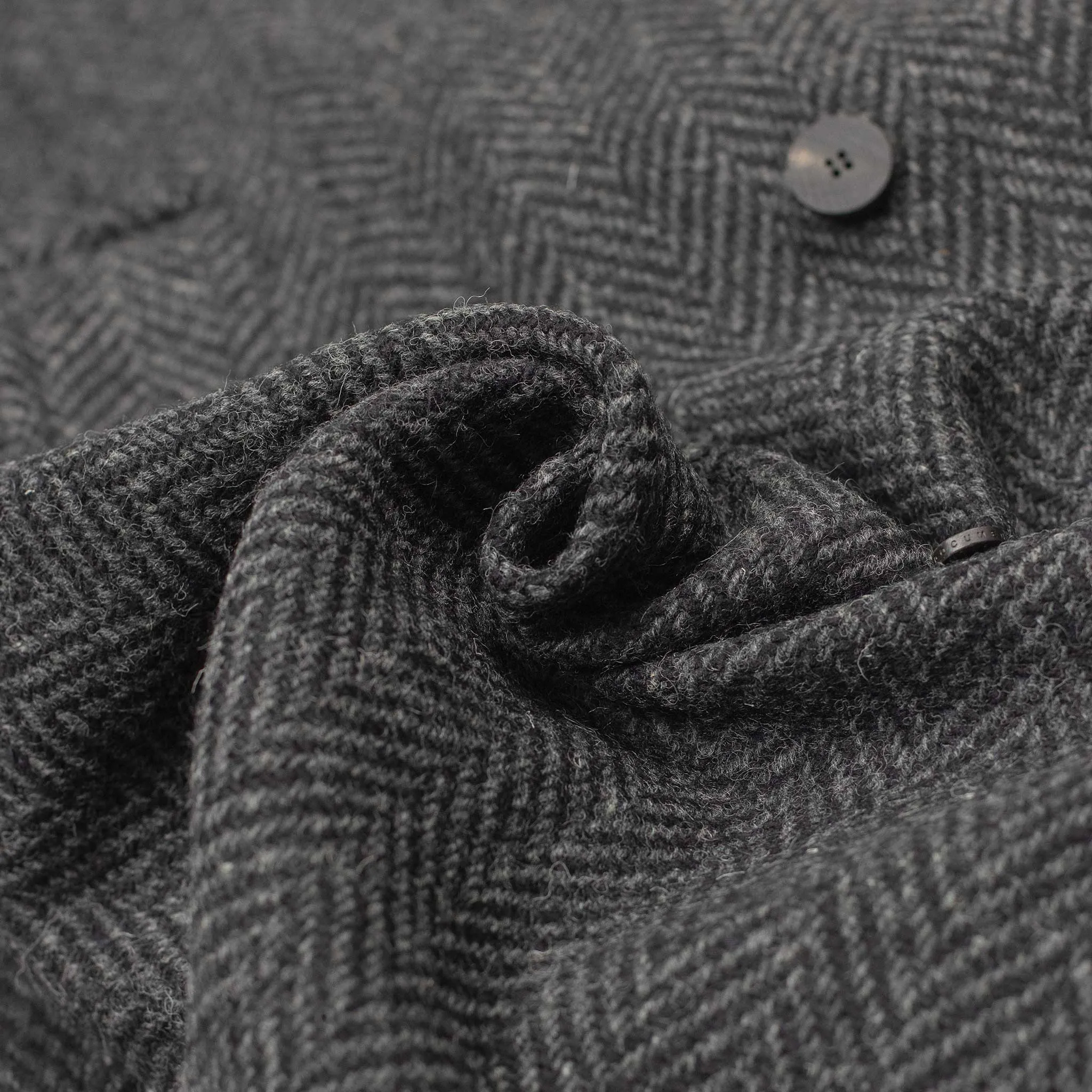 Belted balmacaan in grey herringbone wool donegal tweed